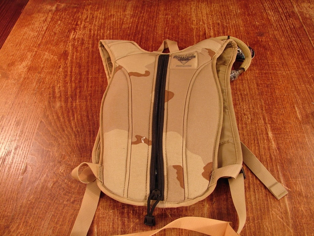 US Military Issue Hydration pack with bladder .: US Military Issue HydraStorm Hydration pack with bladder and one additional bladder. Unused with seal on mouth piece.