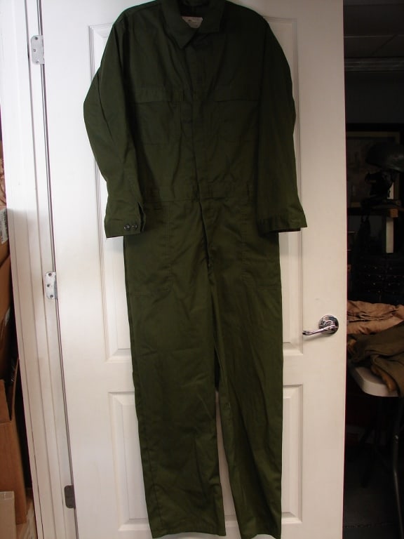 Lot of two US Military issued coveralls.: Lot of two US issued coveralls. 1) utilility Coveralls in near new condition. Size 46 long. 2) Air Force flyers coveralls flight suit. Zipper is broken at bottom. Size 42 Small.