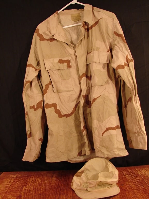 Desert Storm brown camo jacket and hat: Desert Storm brown camo jacket size Large - Long and camo cap size 7 1/4.