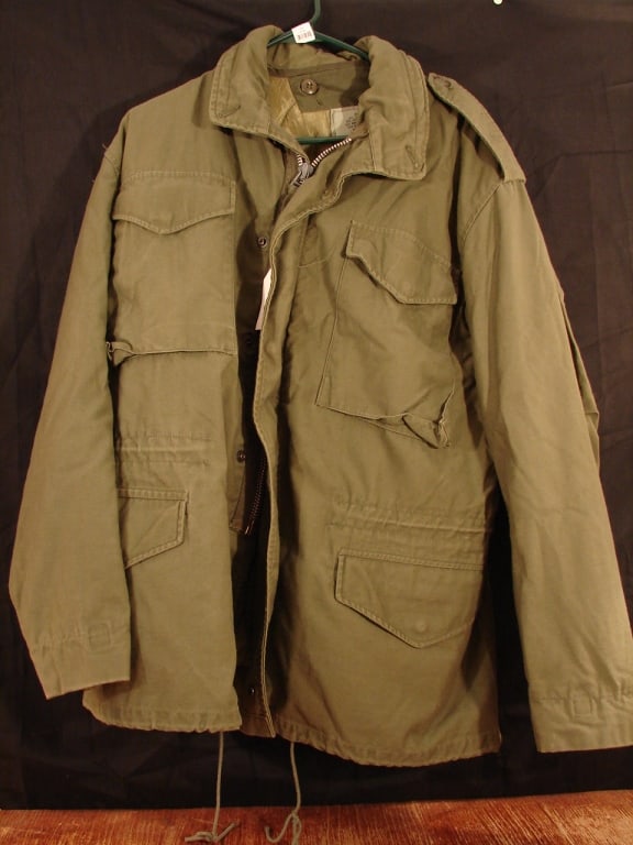 Original US Military issue M65 field jacket: Original US Military issue M65 field jacket. Cold weather lined in near perfect condition. Size Medium.