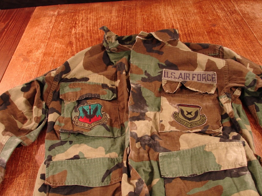 US Air Force Woodland camo hot weather jacket: US Air Force Woodland camo hot weather jacket. Florida National Guard and Tactical Air Command insignias. Size X-small.