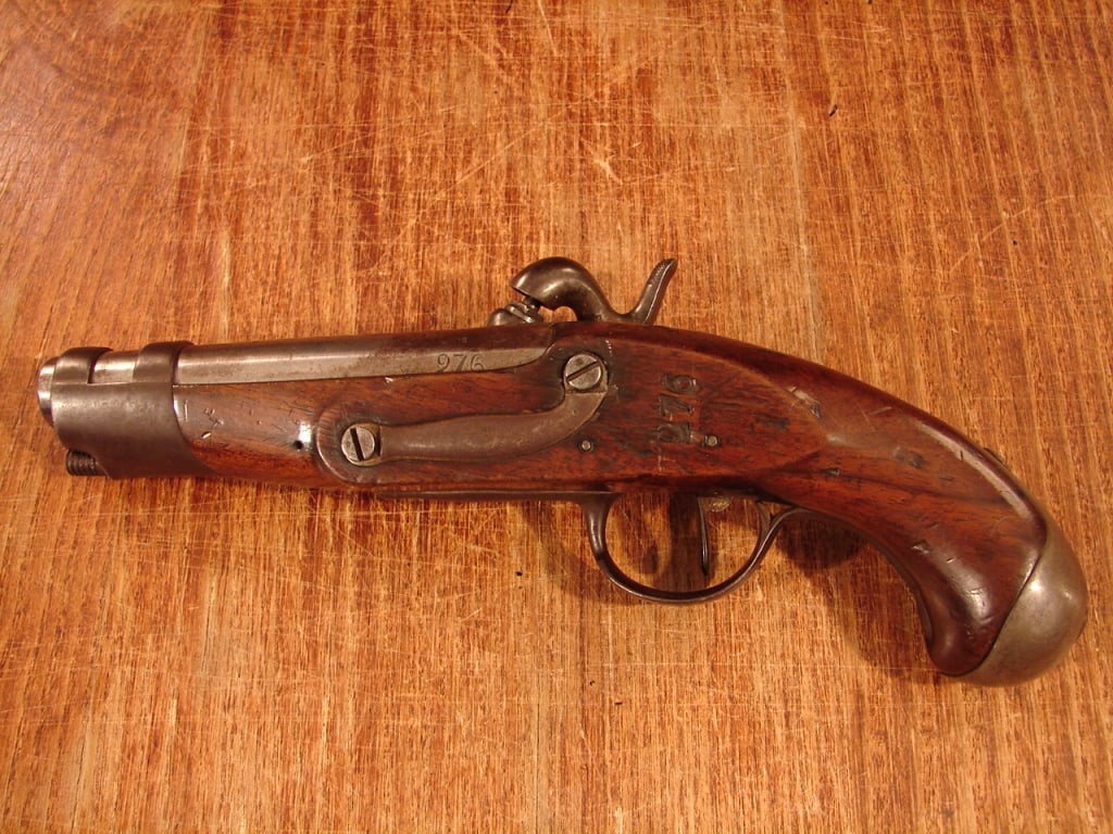 French Percussion Gendarme (Police) Pistol: Circa 1835-50 this pistol has no maker's marks but has French proofs and inventory numbers stamped into the walnut stock and iron barrel. Notably the matching number "276" stamped near the breech and 