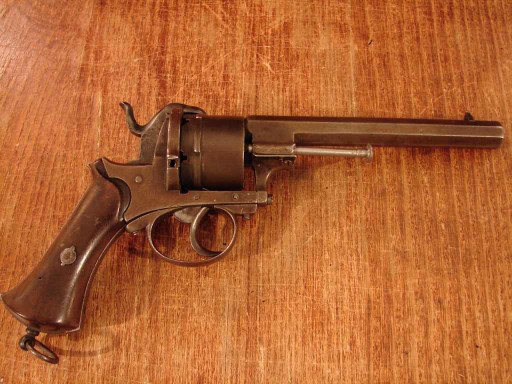 Civil War Period Belgian Pin Fire Revolver: Civil War Period Belgian Pin Fire Revolver. Leige, Belgium proof marks, no other markings about 9mm with walnut stocks and 6" octagonal barrel. Action needs tuning and the ejector rod appears to be