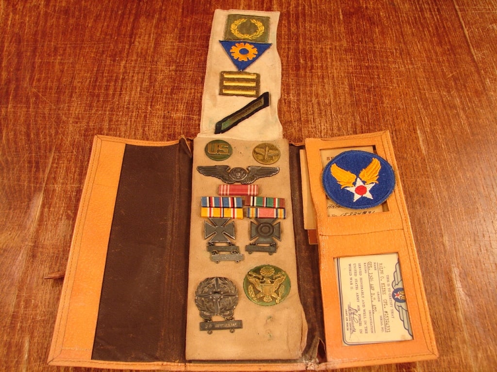 Fine WWII US soldier named medal grouping: Fine WWII US soldier medal grouping. Named grouping for Ralph O. Kline with all of his medals and badges in a fine leather War Service Records case.