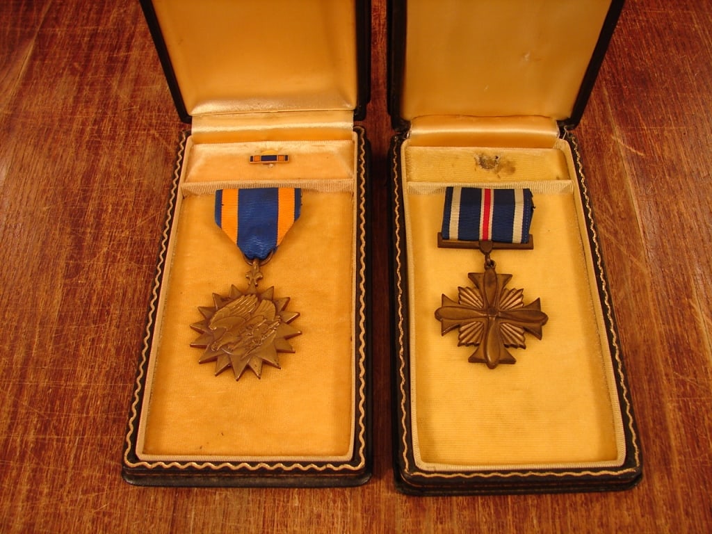 Lot of 2 named U.S. WWII medal groupings.: Lot of 2 named WWII medal groupings. 1) WWII Air Medal. 2) Distinguished Flying Cross. Both with period engraving to Brig. General Laurence K. Ladue.