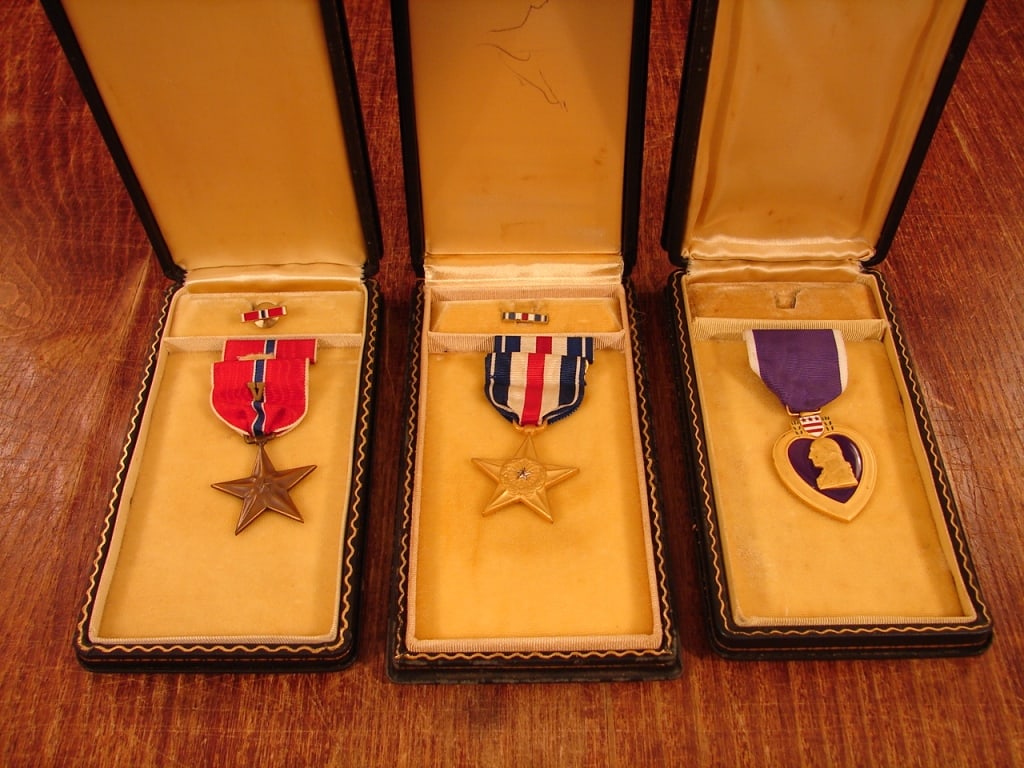 Lot of 3 Named US WWII medal grouping: Lot of 3 Named WWII medal grouping. A one of a kind medal grouping for Howell S. Kopp - Captain US Army. 1) Silver Star. 2) Bronze Star with V. 3) Purple Heart. This unfortunate soldier was aboard