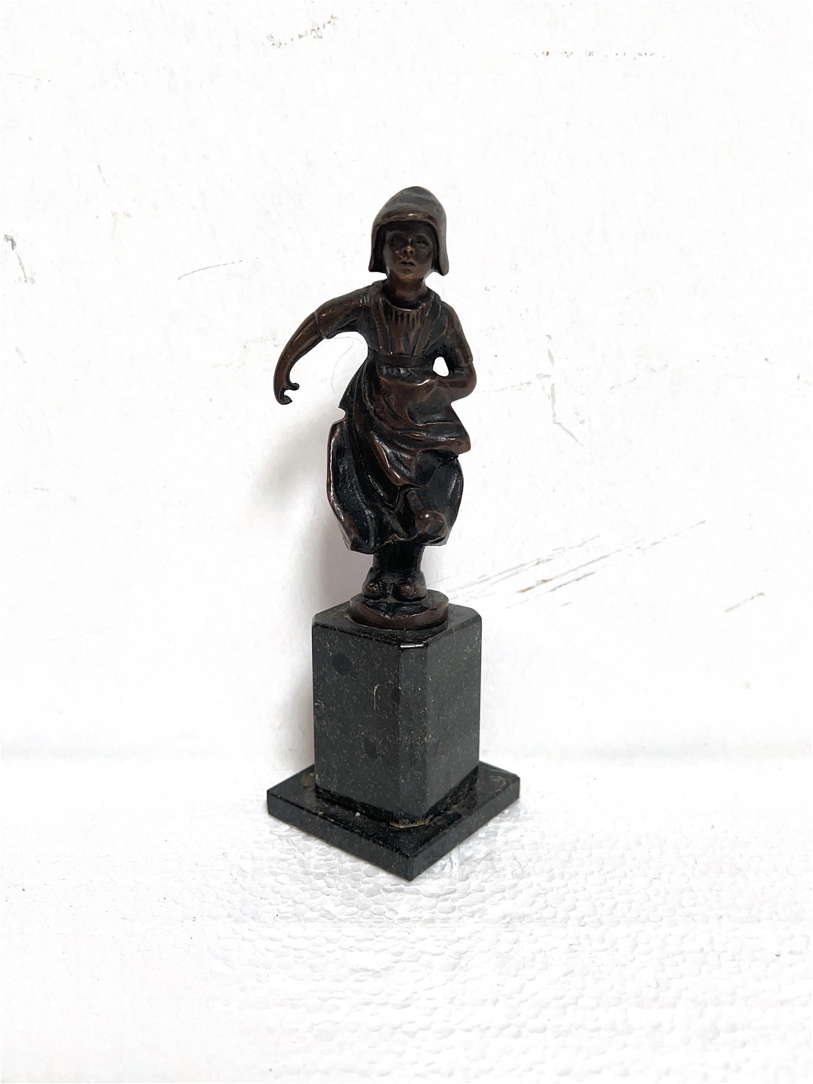 Bronze Dutch Girl Dancing, Nude Model Lady Posing (1920): 2 for One Price. Art Deco Figures. Circa 1920s. Bronze Dutch Girl Dancing. Un-Signed. Antique Conditions. Sculpture has a chipped base. Review photos for more proof. Sculpture 3 3/4'' in. W/ Base 6''