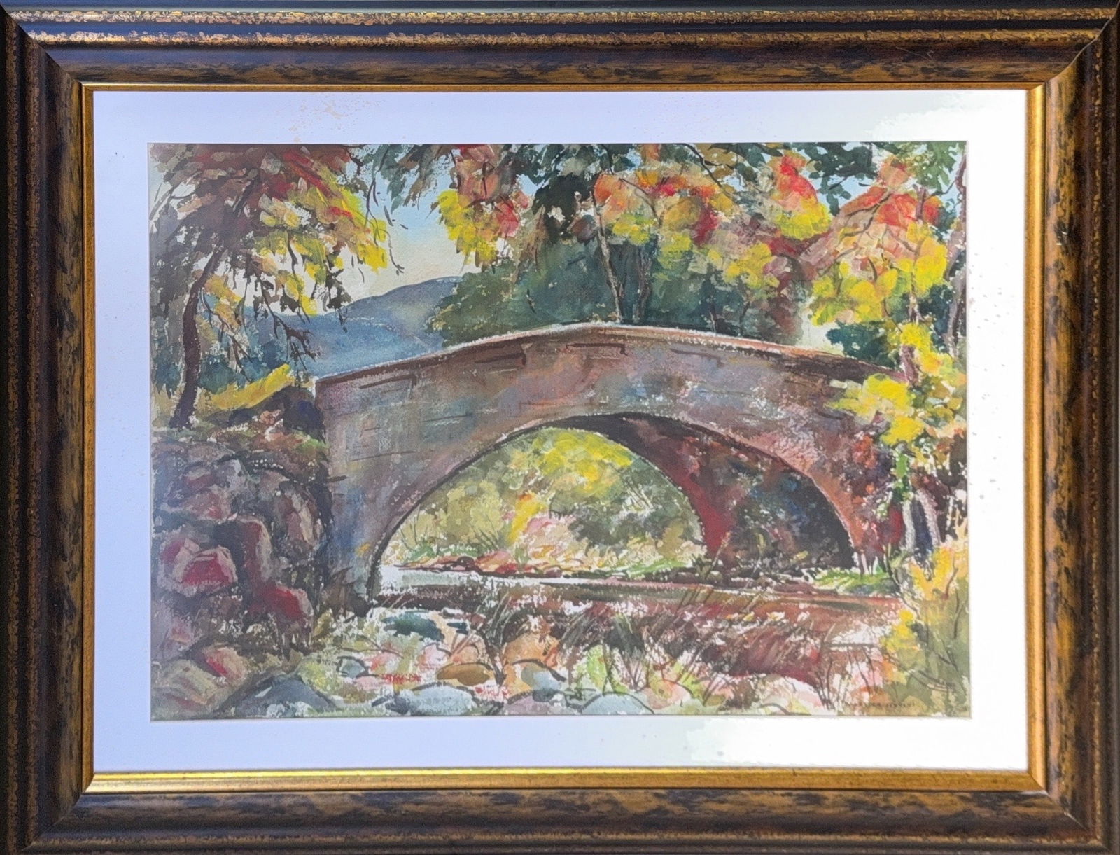 William Lester Stevens, Watercolor on Paper, American (1888 - 1969): KEYWORDS: Rural landscape, Stone bridge, River/stream, Autumn foliage, Trees, Rocks/boulders (foreground), Reflections (in the water), Artwork. Born: 1888 - Rockport, Massachusetts. Died: 1969 - Sprin