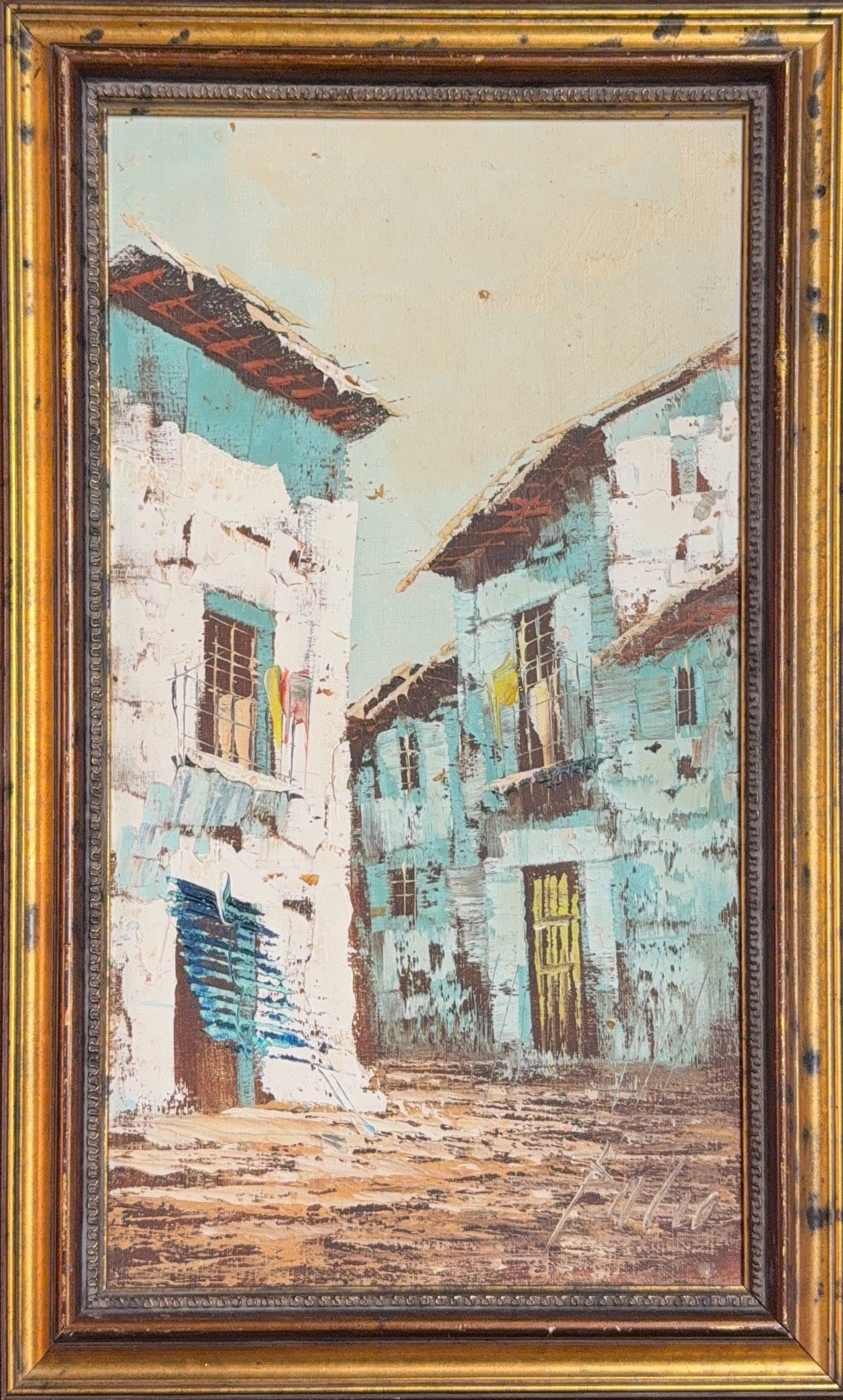 Mystery Artist, Julio, Oil on Canvas (20th Centuary): Possibly and Italian Piece. Vintage mid-century expressionist oil painting on Canvas. The painting features narrow, sun-drenched streets lined with rustic, multi-story buildings. These structures ofte