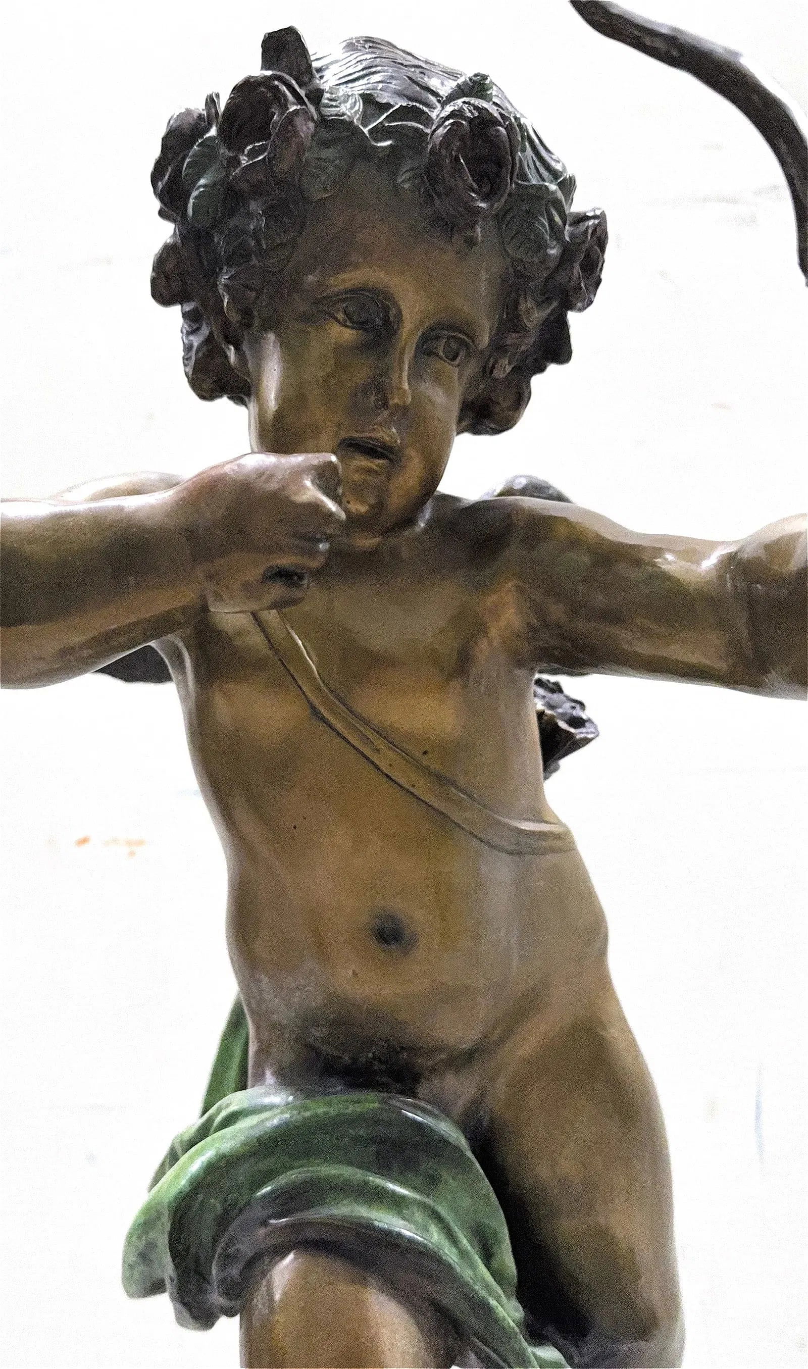 In the Manner of Hudon - Cupid Bronze Sculpture: KEYWORDS: Sculpture, Bronze, Patinated, Cupid, Cupido, Jean-Antoine Houdon, Neoclassical art, Roman mythology, Statue, Winged child, Love Story. Depicts the Roman God of Love as a young, winged boy ai