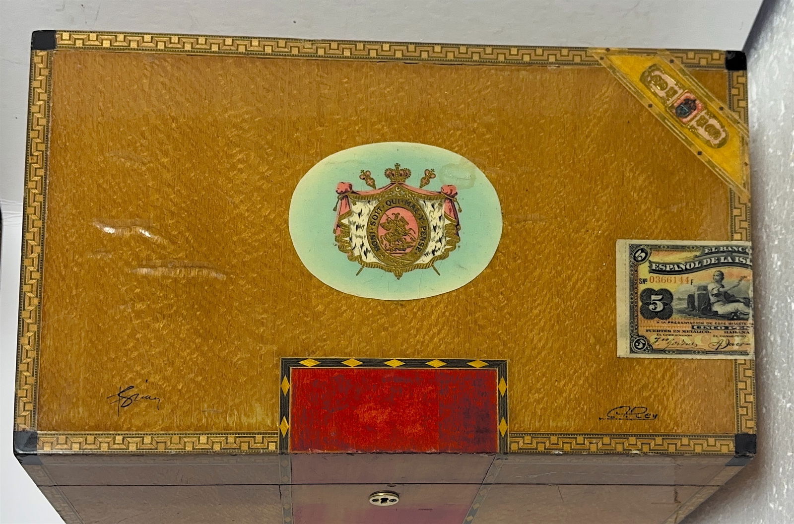 Antique Cuban Handmade Wooden Cigar Humidor: Cigar Box. This is a specialized storage box designed to maintain constant humidity for cigars. The box is crafted with a wood exterior, featuring decorative inlays or marquetry around the edges and l