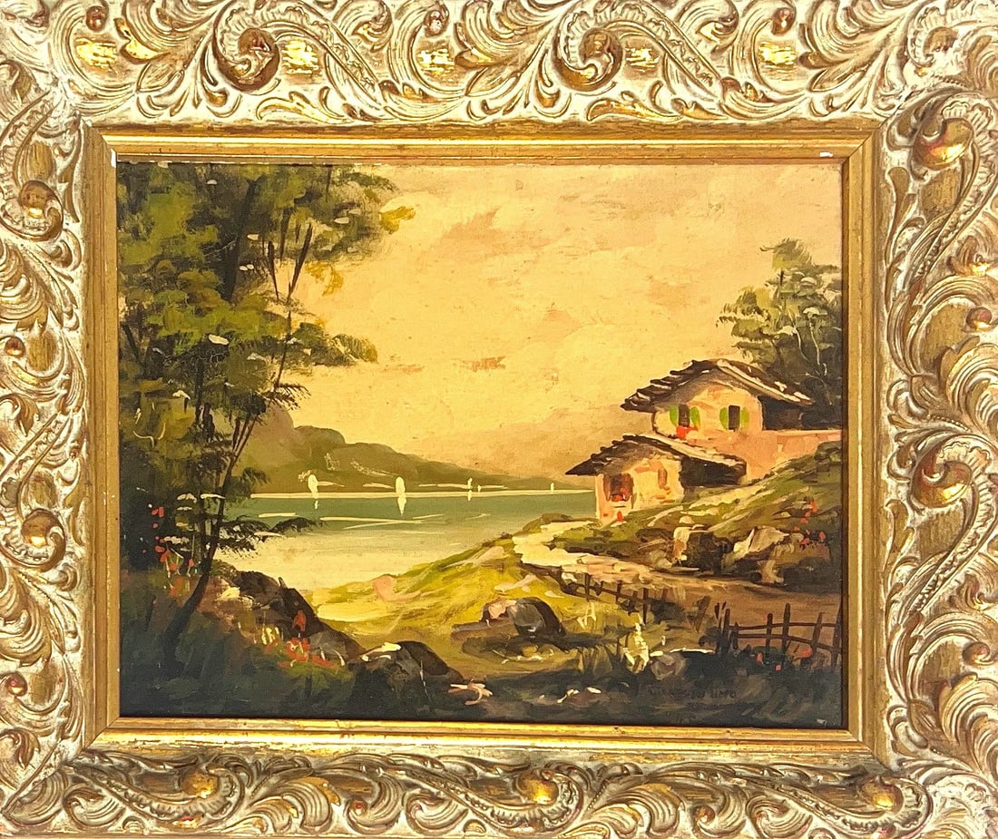 Acacio Lino, Oil on Board, Portuguese (1878 - 1956): KEYWORDS: Rustic cabin architecture, lakeside, lush greenery, warm palette. Born: 1878. Died : 1956. Born in Amarante, Acácio Lino studied at the Oporto Academy of Fine Arts where he was later to tea