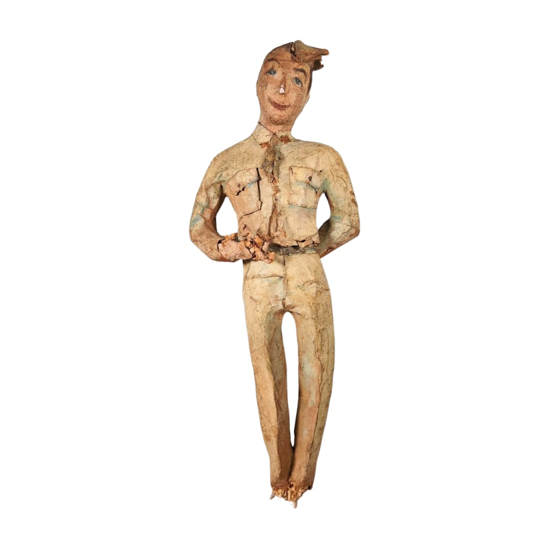Vintage WWII Papier-Mache Soldier Folk Art Figure: Handcrafted papier-mâché figure depicting a soldier in uniform, likely a WWII era folk art piece. The figure features details, including a tie and pocketed shirt. Unknown artist or maker. Measures 2
