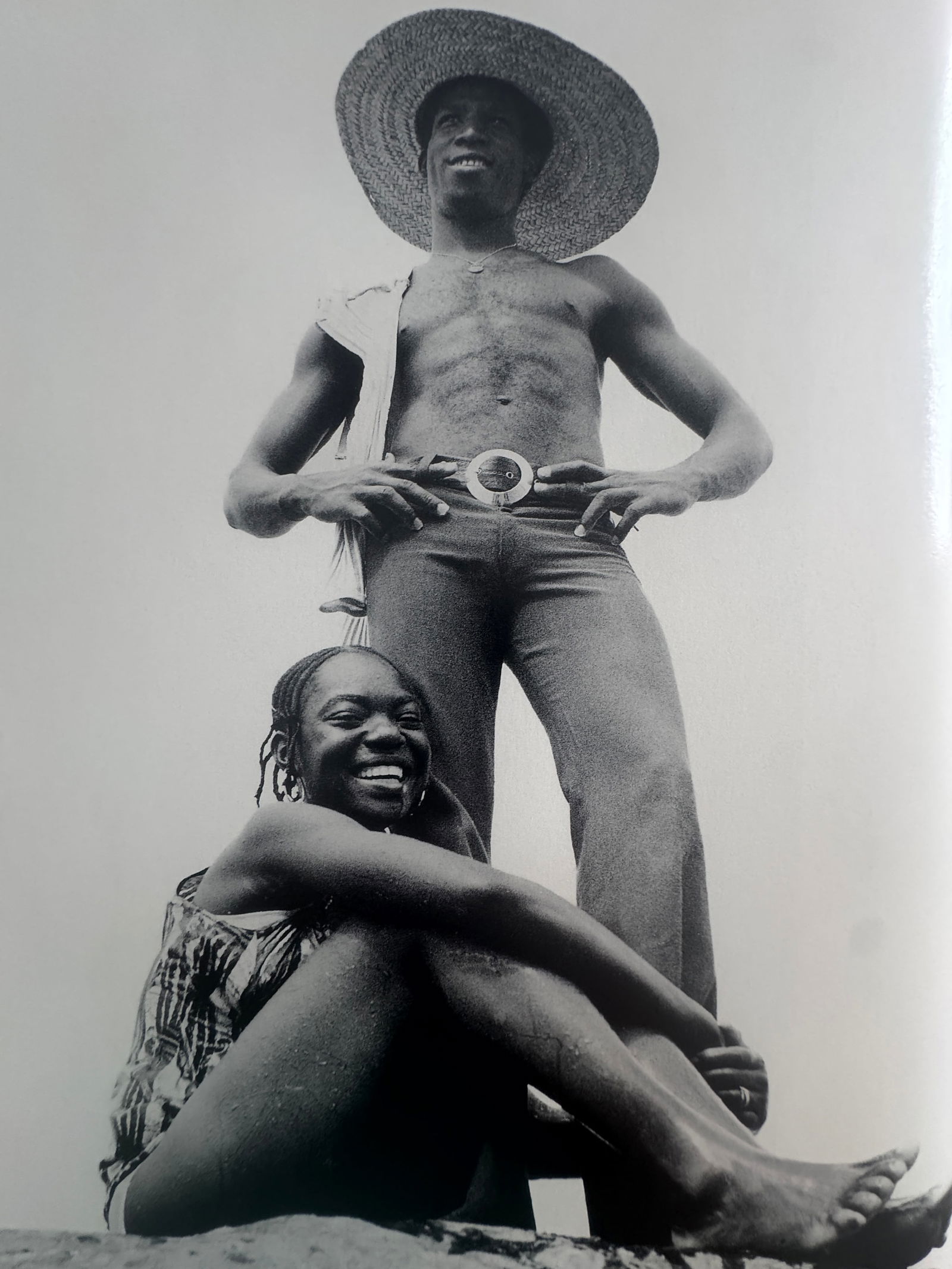 Malick Sidibe (Malian, 1935-2016): Malick Sidibe (Malian, 1935-2016). On the Rocks at the Chaussee, "1976" Print. 10.60 x 8.00 inches. Printed in 1998. Please be aware that all lots in our auctions are sold "AS IS," in accordance with
