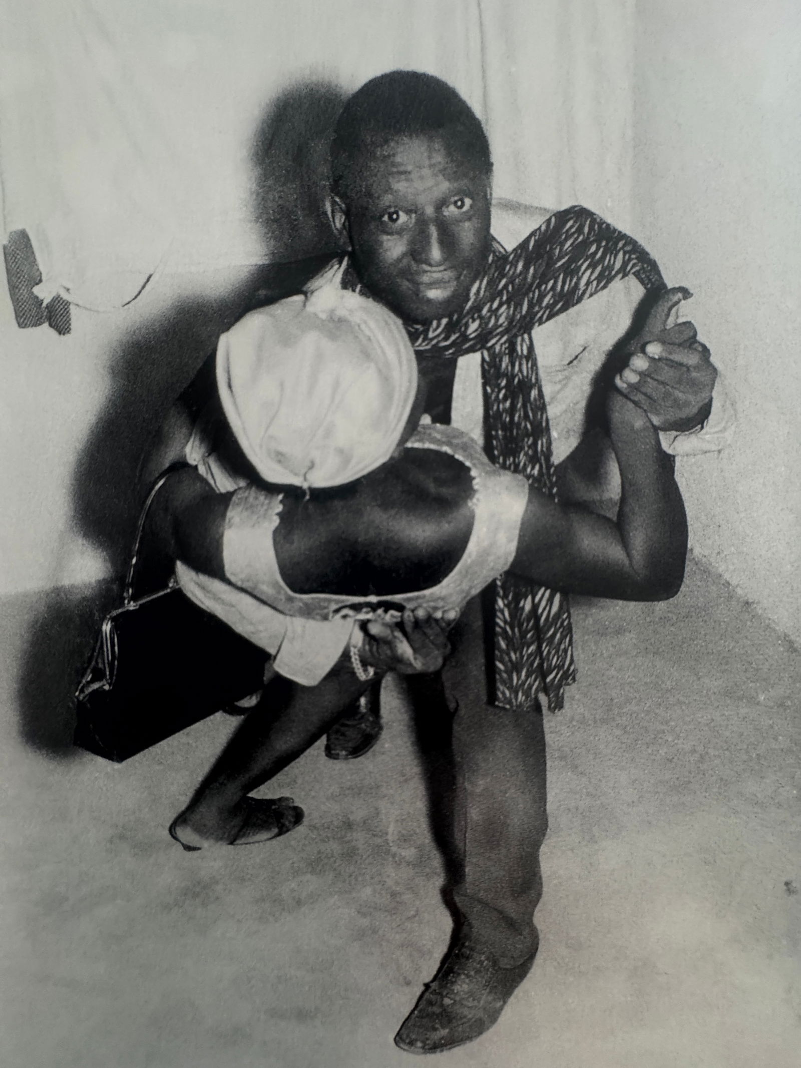 Malick Sidibe (Malian, 1935-2016): Malick Sidibe (Malian, 1935-2016). A Couple of Dancers at the Beatles Club of Bagadaji, "1966" Print. 9.50 x 6.25 inches. Printed in 1998. Please be aware that all lots in our auctions are sold "AS IS