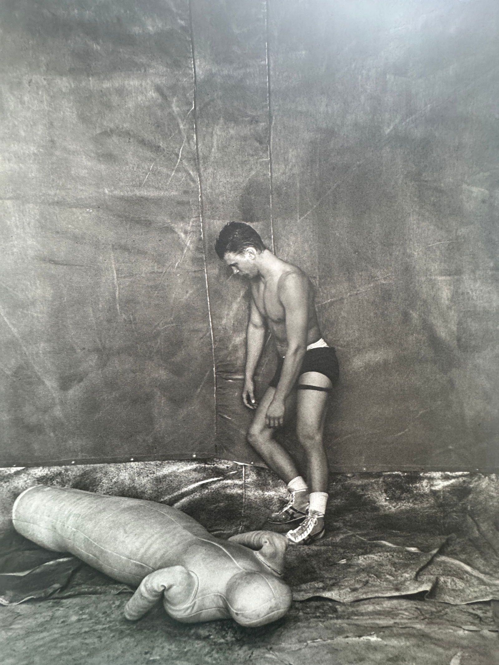 Bruce Weber (American, b. 1946): Bruce Weber (American, b. 1946). Male with Inflatable Print. Printed in 1988. 11.25 x 8.60 inches. Please be aware that all lots in our auctions are sold "AS IS," in accordance with the Terms & Condit