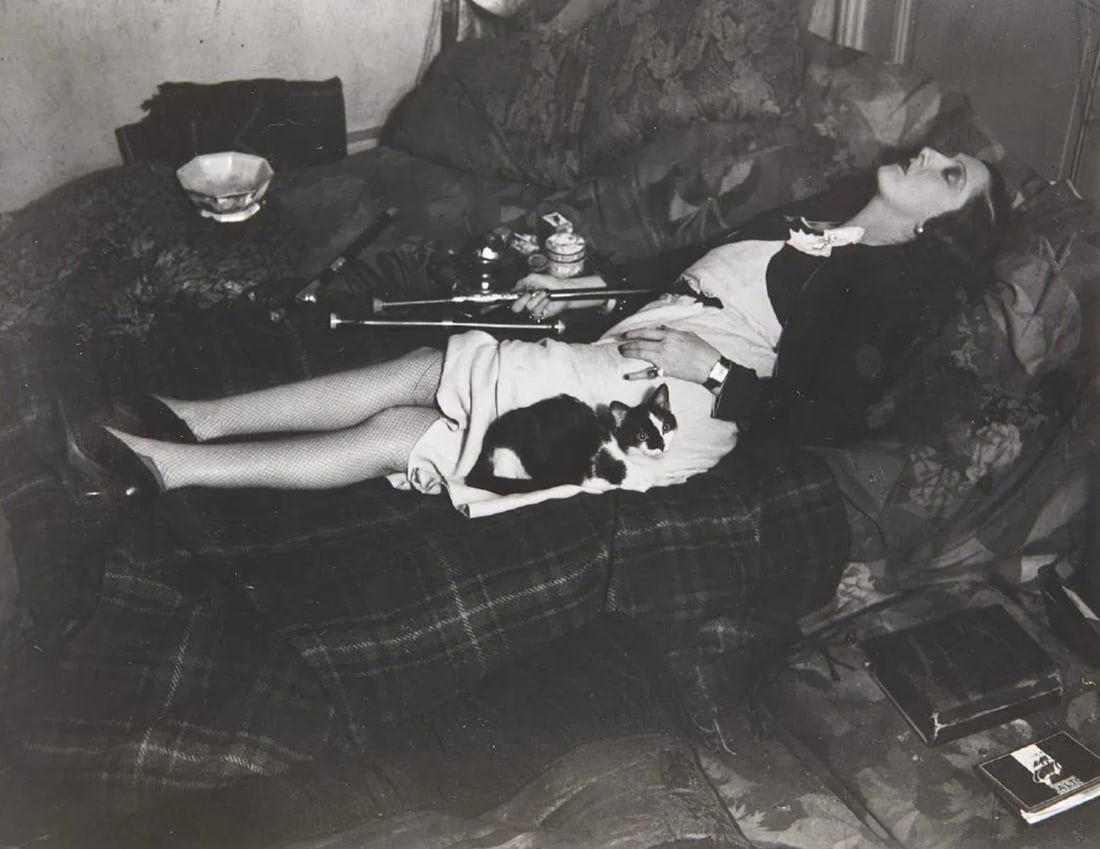 Brassai (Hungarian-French, 1899-1984): Brassai (Hungarian-French, 1899-1984). Woman Smoking Opium, 1931 Silver Gelatin. 9.25 x 11.50 inches. Please be aware that all lots in our auctions are sold "AS IS," in accordance with the Terms & Con