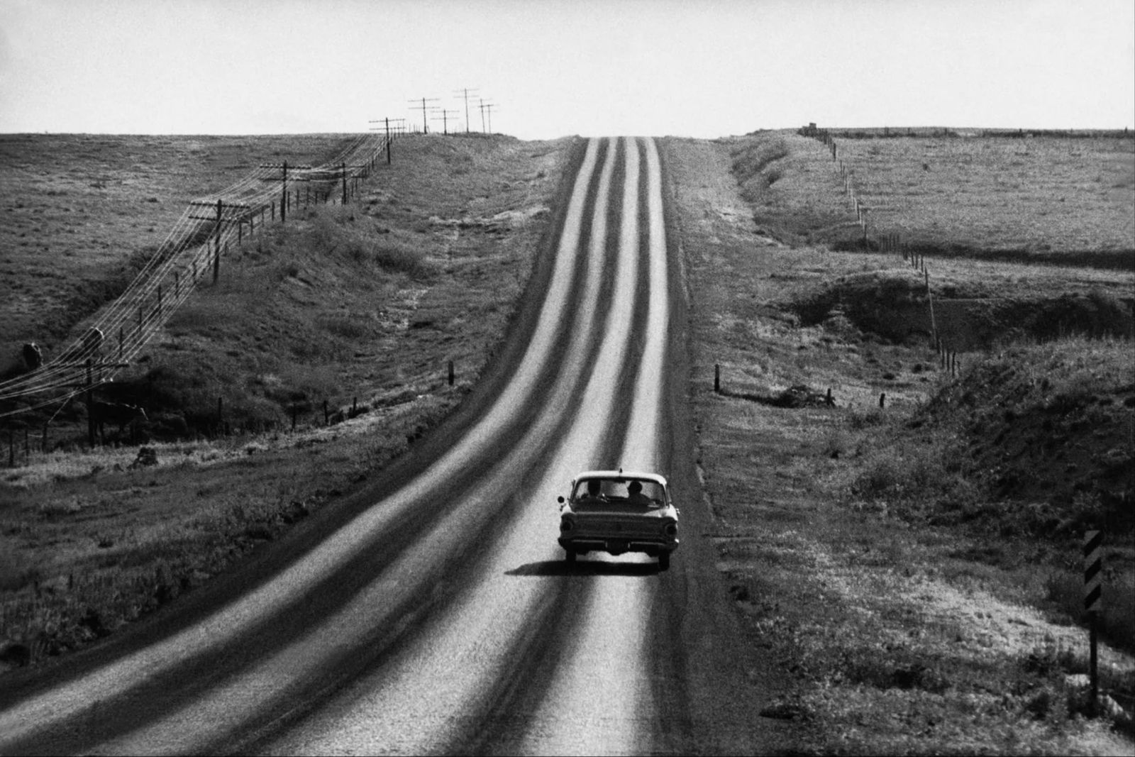 Cornell Capa (Hungarian-American, 1918-2008): Cornell Capa (Hungarian-American, 1918-2008). Rural Highway, "1959" Print. Please be aware that all lots in our auctions are sold "AS IS," in accordance with the Terms & Conditions of the Auction. All