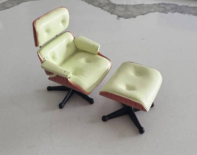 Small Eames Display Chair with Ottoman: Small Eames Display Chair with Ottoman. 3.00 x 2.25 x 3.00 inches. Please be aware that all lots in our auctions are sold "AS IS," in accordance with the Terms & Conditions of the Auction. All
