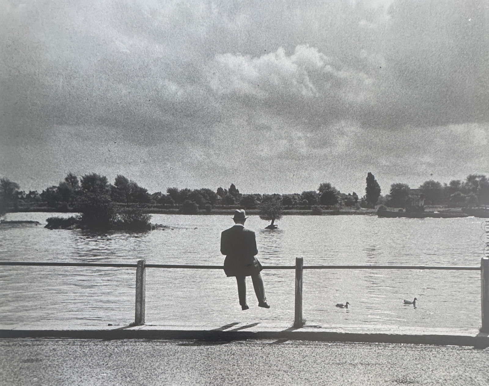 Cornell Capa (Hungarian-American, 1918-2008) Print: Cornell Capa (Hungarian-American, 1918-2008) Print. Printed in 1992. Duotone. Alec Guiness studying his lines, London, "1952". 7.00 x 8.75 inches. Please be aware that all lots in our auctions are sol