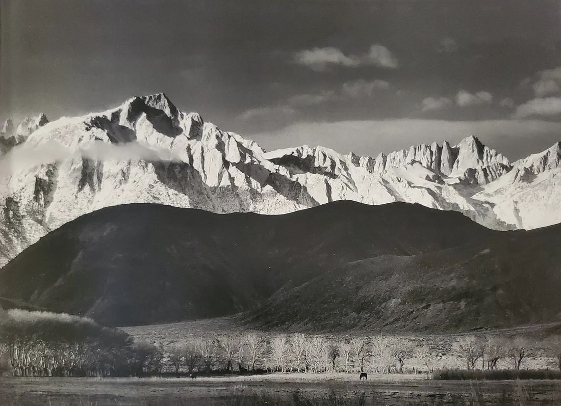 Ansel Adams (American, 1902-1984) Print: Ansel Adams (American, 1902-1984) Print. Winter Sunrise, Sierra Nevada, from Lone Pine, California, "1944". Printed in 2007, Italy. 8.00 x 6.00 inches. Please be aware that all lots in our auctions ar