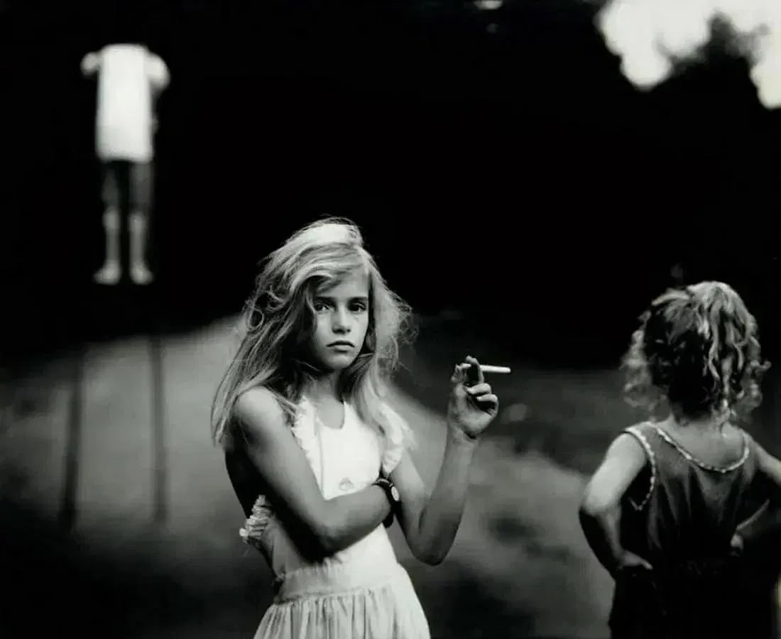 Sally Mann (American, b. 1951): Sally Mann (American, b. 1951). Candy Cigarette, "1989" Print. 8.00 x 9.50 inches. Please be aware that all lots in our auctions are sold "AS IS," in accordance with the Terms & Conditions of the Auct
