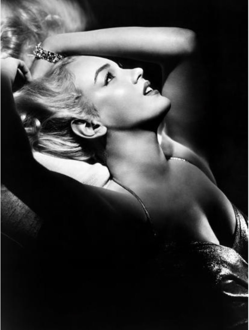 Marilyn Monroe (American, 1926-1962) Print: Marilyn Monroe (American, 1926-1962) Print. 24.00 x 32.00 inches. Please be aware that all lots in our auctions are sold "AS IS," in accordance with the Terms & Conditions of the Auction. All "dates" 