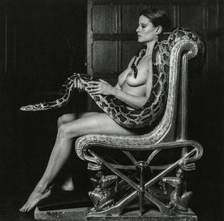 Robert Mapplethorpe (American, 1946-1989) Print: Robert Mapplethorpe (American, 1946-1989). Lisa Lyon with a Snake, "1983" Print. 6.10 x 6.10 inches. Printed in 1983, Italy. Please be aware that all lots in our auctions are sold "AS IS," in accordan