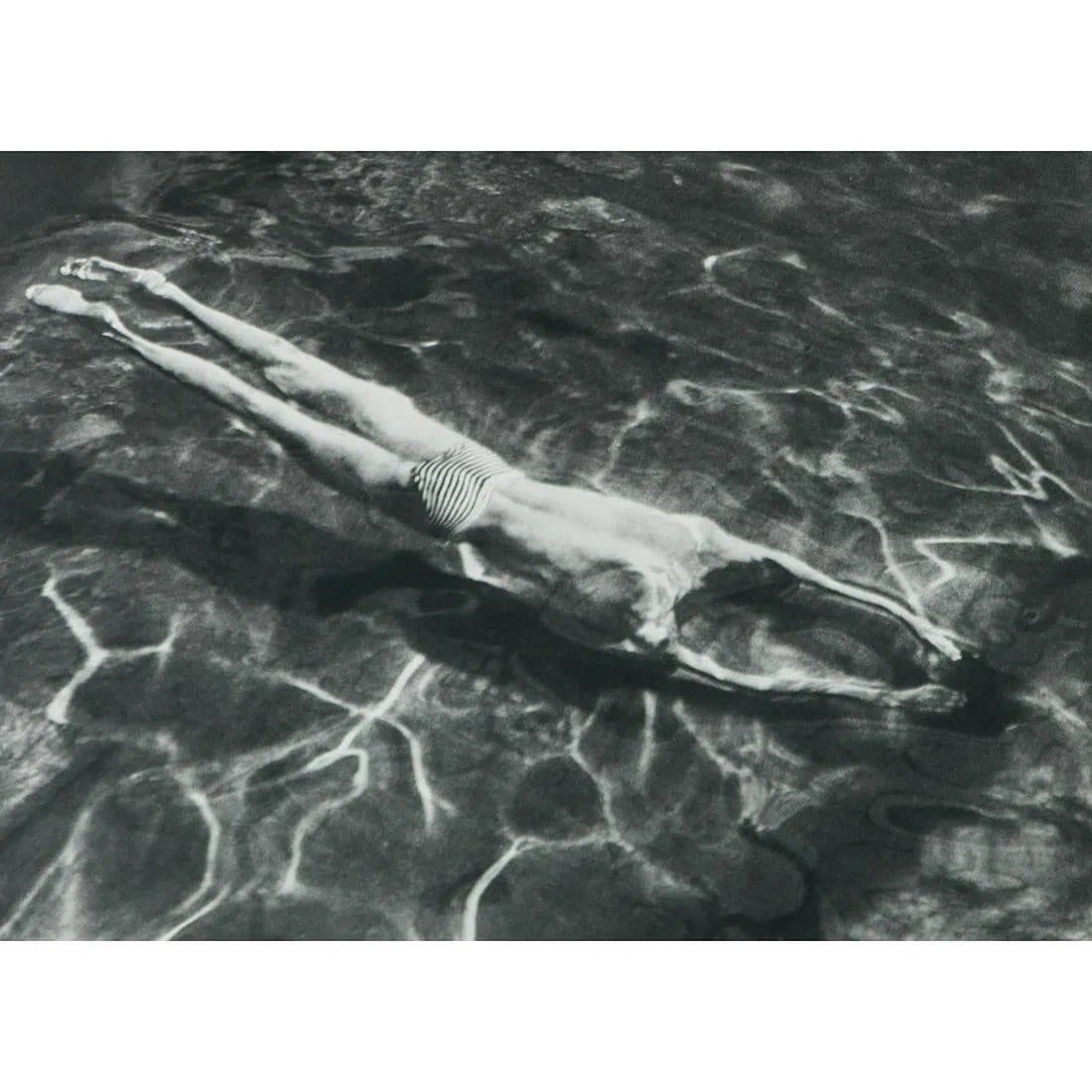 Andre Kertesz (Hungarian-American, 1894-1985) Print: Andre Kertesz (Hungarian-American, 1894-1985) Print. Underwater Swimmer, "1917". Printed in 1970s, France. 6.50 x 9.00 inches. Please be aware that all lots in our auctions are sold "AS IS," in accord