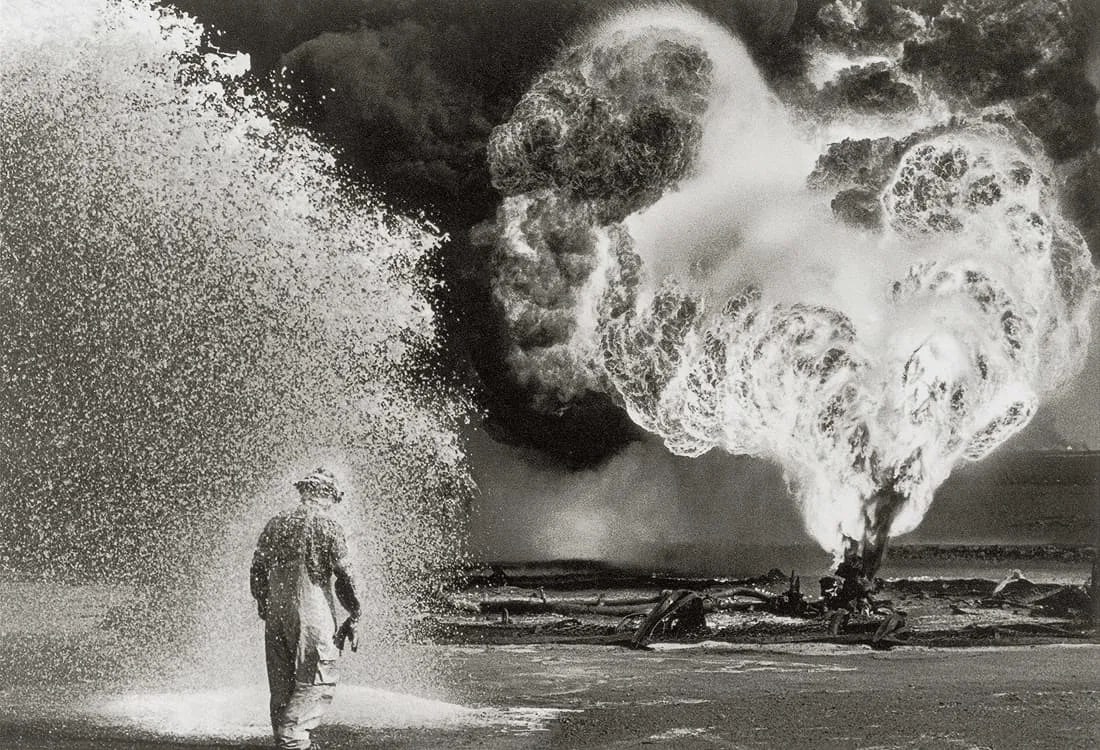 Sebastiao Salgado (Brazilian, 1944-2025) Print: Sebastiao Salgado (Brazilian, 1944-2025) Print. Burhan Oil Field on Fire, Kuwait, "1991". Printed in 2012, Italy. 8.75 x 6.00 inches. Please be aware that all lots in our auctions are sold "AS IS," in