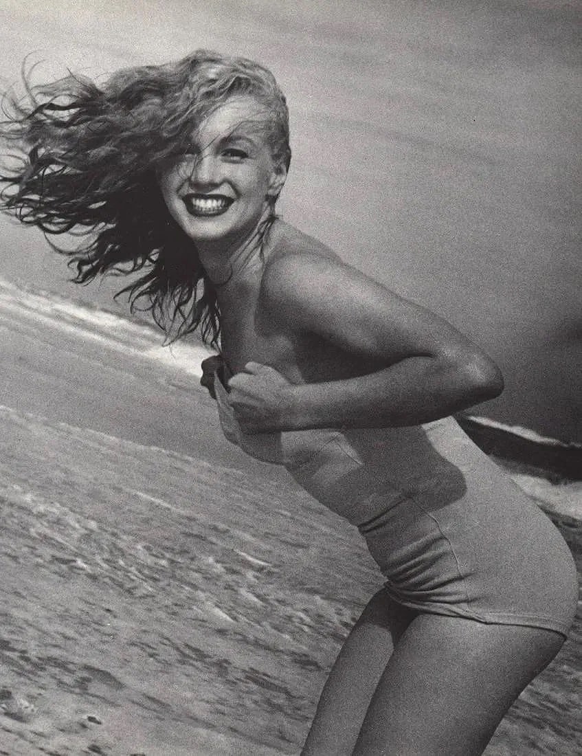Andre de Dienes (Hungarian, 1913-1985) Print: Andre de Dienes (Hungarian, 1913-1985). Marilyn Monroe, Norma Jean, Beach Print. 12.00 x 9.50 inches. Printed in the 1980s. Please be aware that all lots in our auctions are sold "AS IS," in accordanc
