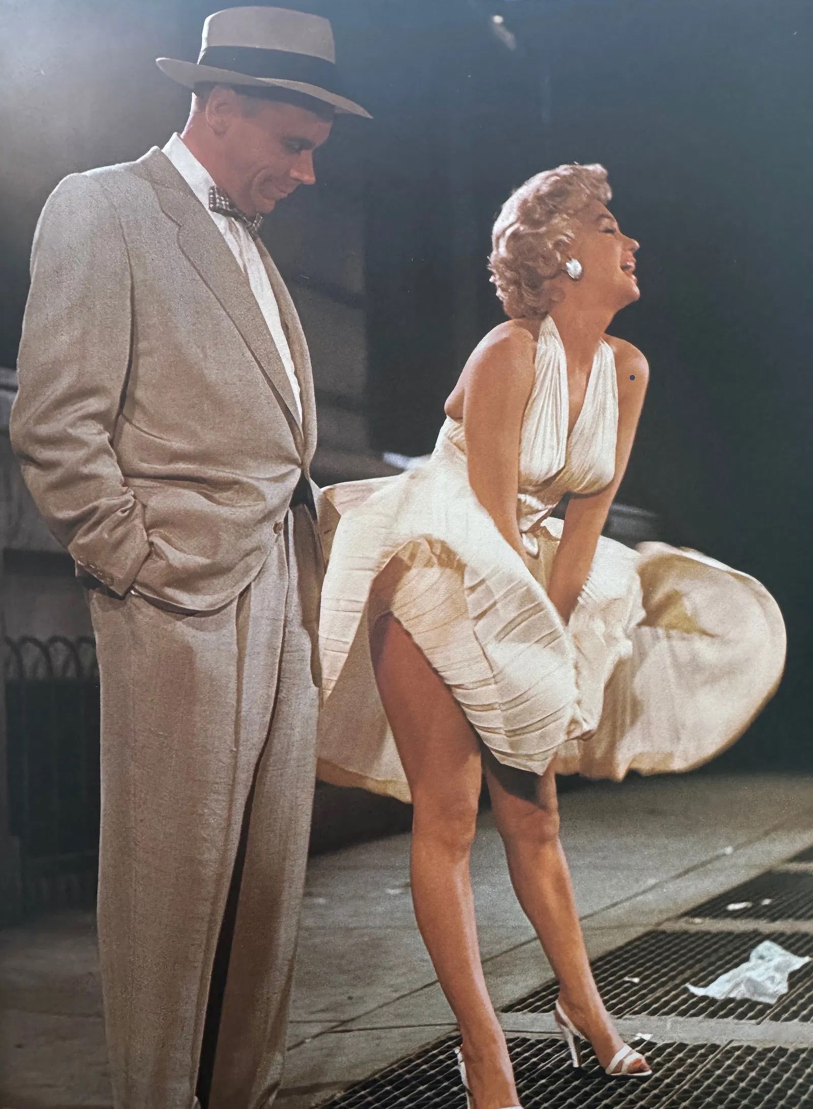 Sam Shaw (American, 1912-1999) Print: Sam Shaw (American, 1912-1999) Marilyn Monroe, Joe Dimaggio, New York, "1954" Print. 10.25 x 7.50 inches. Printed in 1973. Small dot on Marilyn's left arm. Please be aware that all lots in our auction