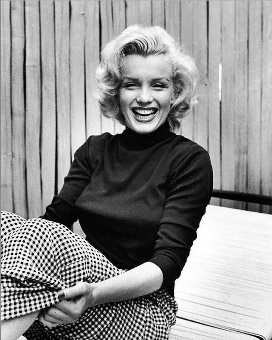 Alfred Eisenstaedt (American, 1898-1995) Print: Alfred Eisenstaedt (American, 1898-1995) Marilyn Monroe on Home Patio Photo Print. 24.00 x 30.00 inches. Please be aware that all lots in our auctions are sold "AS IS," in accordance with the Terms &