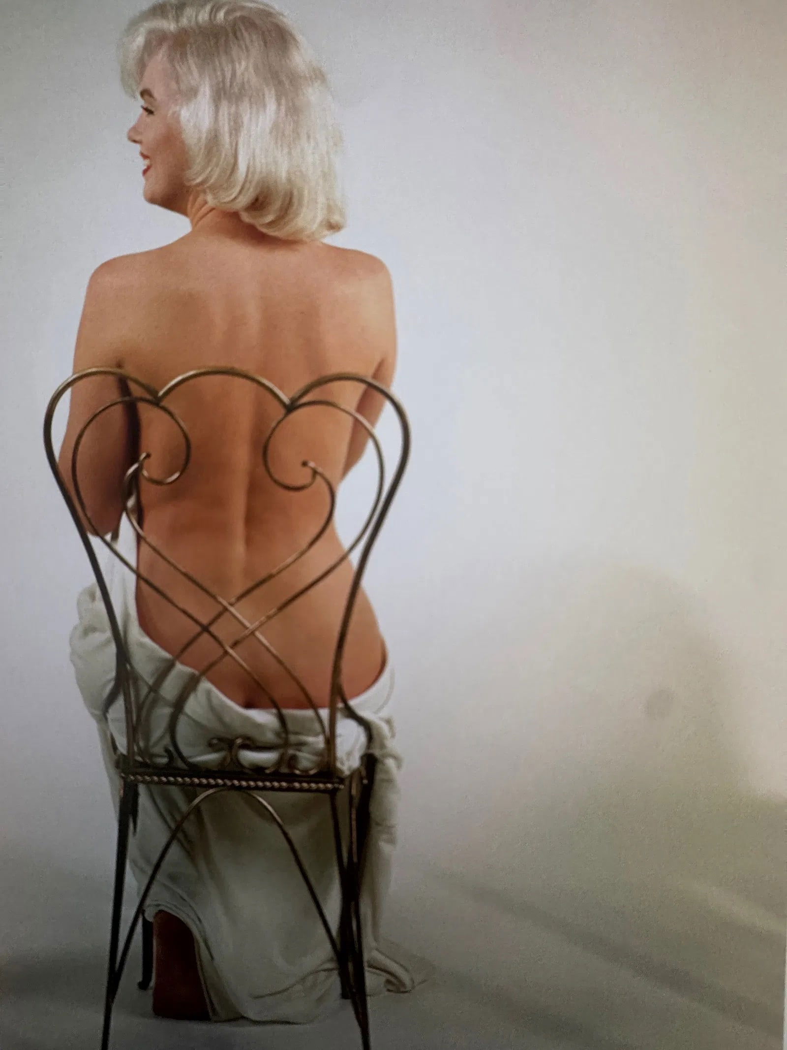 Eve Arnold (American, 1912-2012) Marilyn Monroe Print: Eve Arnold (American, 1912-2012) Marilyn Monroe Print. Printed in Belgium. 9.60 x 6.75 inches. Please be aware that all lots in our auctions are sold "AS IS," in accordance with the Terms & Conditions