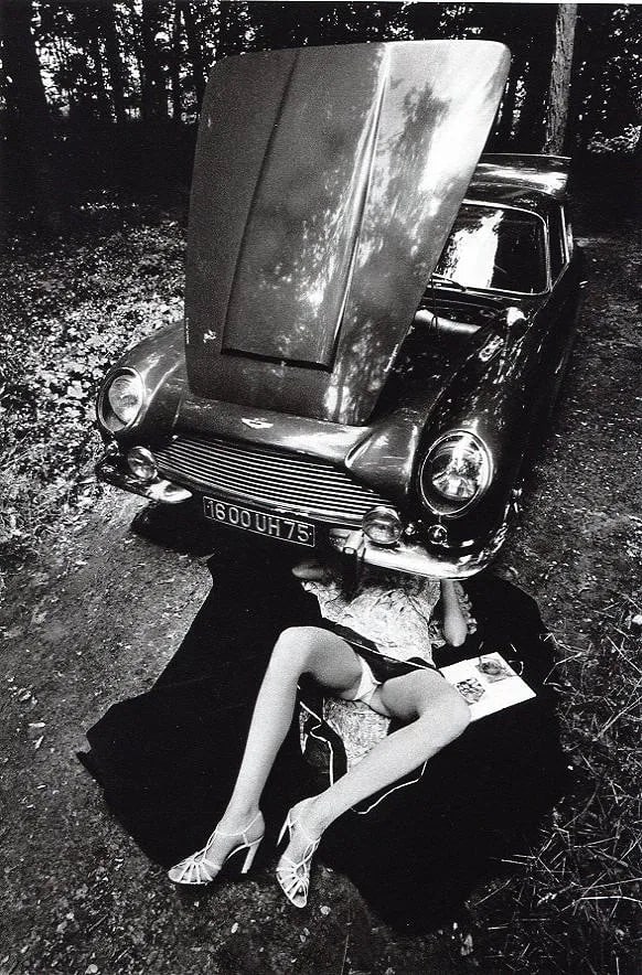 Jean-Loup Sieff (French, 1933-2000) Print: Jean-Loup Sieff (French, 1933-2000) Print. Nude, Aston Martin. Printed in 1982, France. 6.00 x 9.00 inches. Please be aware that all lots in our auctions are sold "AS IS," in accordance with the Terms