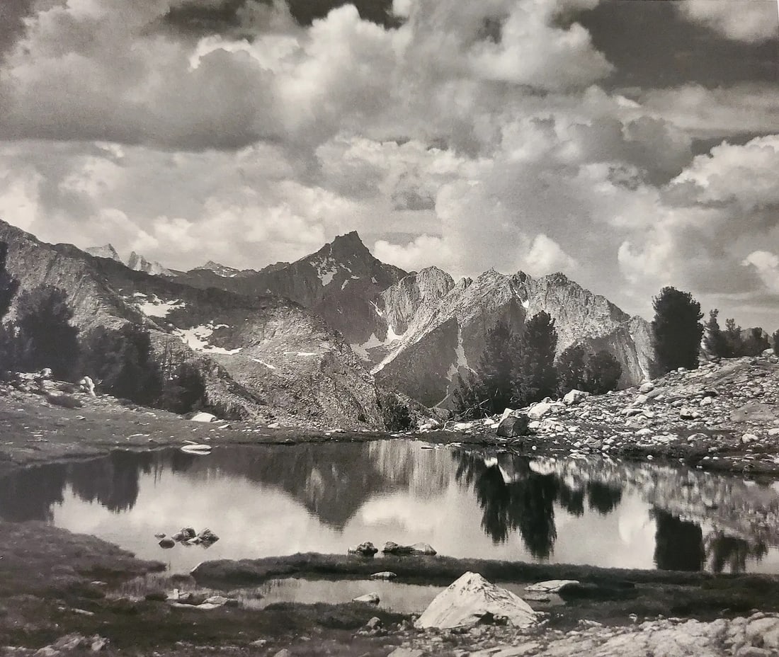 Ansel Adams (American, 1902-1984) Print: Ansel Adams (American, 1902-1984) Print. Mount Clarence King, Pool, Kings Canyon National Park, California, "1925". Printed in 2007, Italy. 6.00 x 5.00 inches. Please be aware that all lots in our auc