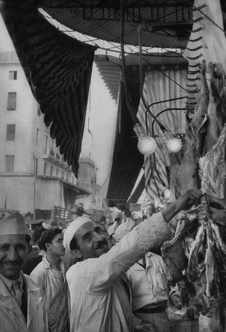 Arnold Genthe (German-American, 1869-1942) Print: Arnold Genthe (German-American, 1869-1942) Print. Athens, Butcher Shop. Printed in 1955, USA. 10.00 x 13.00 inches. Please be aware that all lots in our auctions are sold "AS IS," in accordance with t