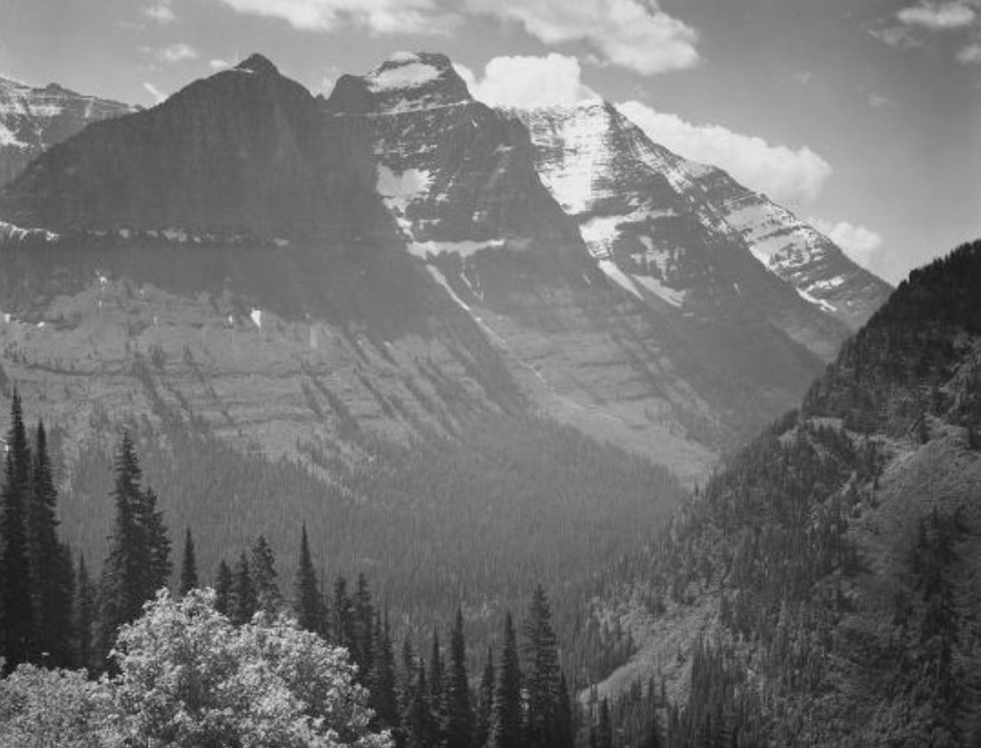Ansel Adams (American, 1902-1984) Print: Ansel Adams (American, 1902-1984) Print. Valley Snow Covered Mountains, Glacier National Park Print. 39.50 x 29.85 inches. Please be aware that all lots in our auctions are sold "AS IS," in accordance