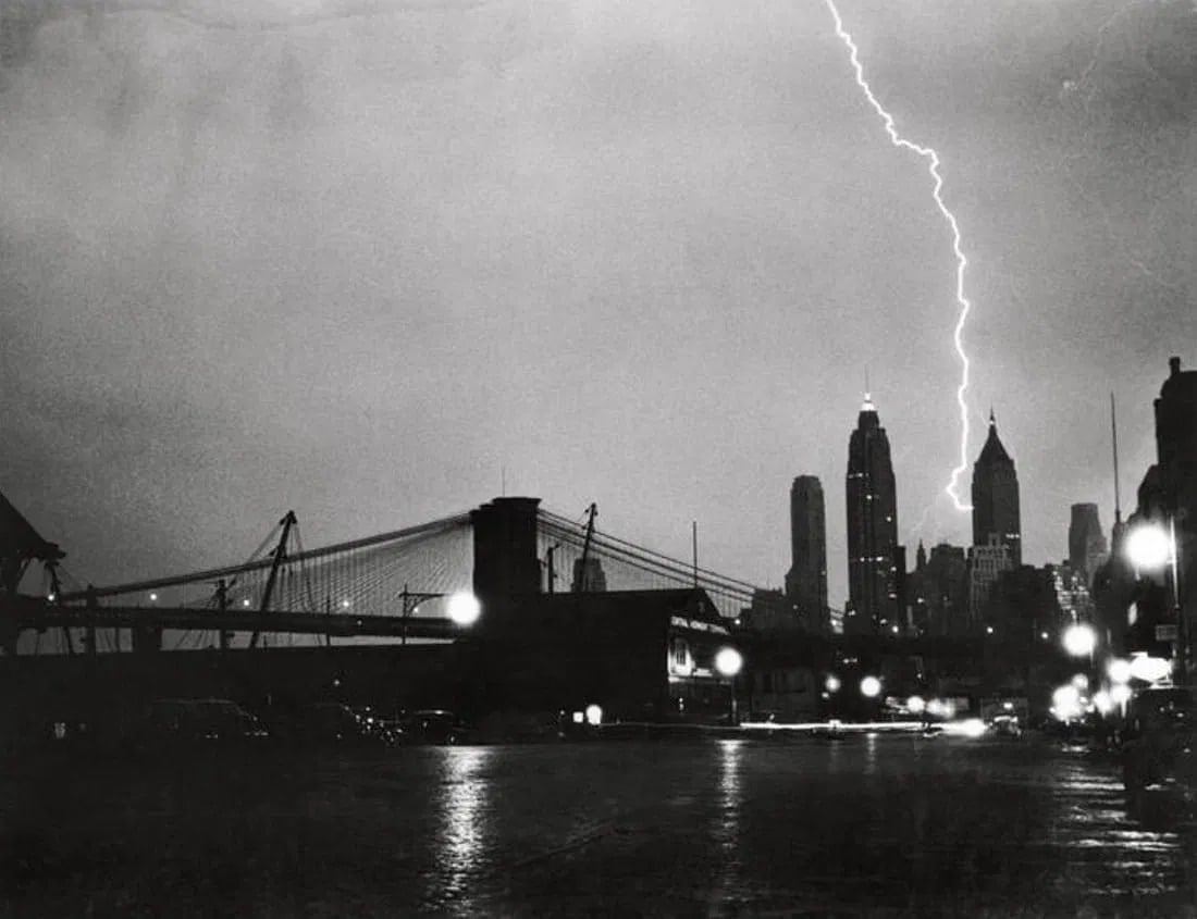 Weegee (American, 1899-1968) Print: Weegee (American, 1899-1968) Bolt of Lightning, City Bank Farmers Trust Co. 20 Exchange Place, New York, "1940" Print. 37.50 x 29.00 inches. Please be aware that all lots in our auctions are sold "AS