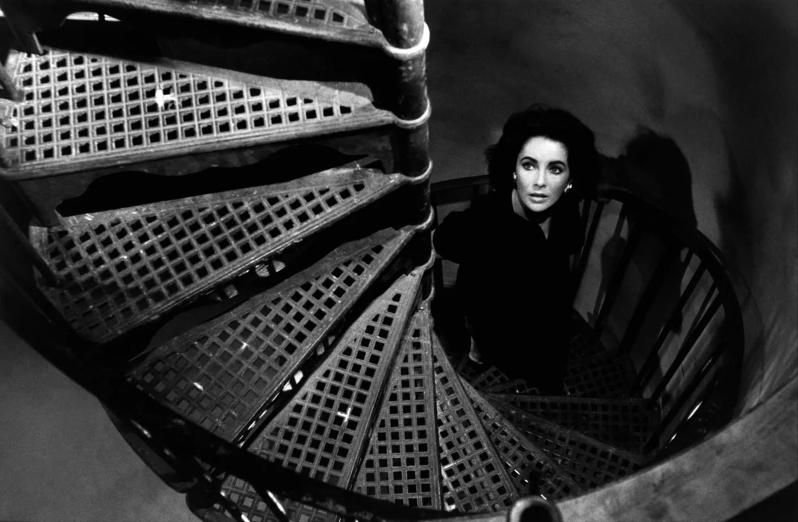 Burt Glinn (American, 1925-2008) Print: Burt Glinn (American, 1925-2008) Print. Elizabeth Taylor on the set of 'Suddenly Last Summer', "1959". 14.00 x 20.00 inches. Please be aware that all lots in our auctions are sold "AS IS," in