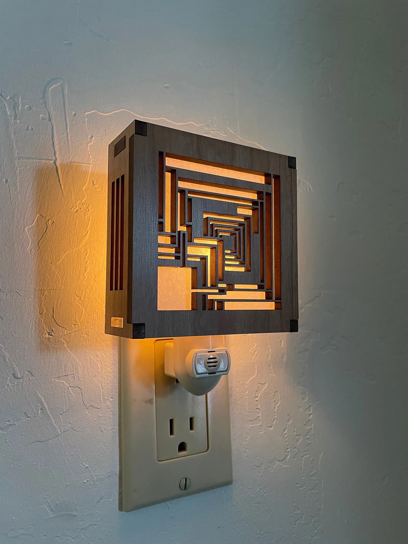 Frank Lloyd Wright (American, 1867-1959) Light: Frank Lloyd Wright (American, 1867-1959). Plug in wall light. Please be aware that all lots in our auctions are sold "AS IS," in accordance with the Terms & Conditions of the Auction. All "dates"
