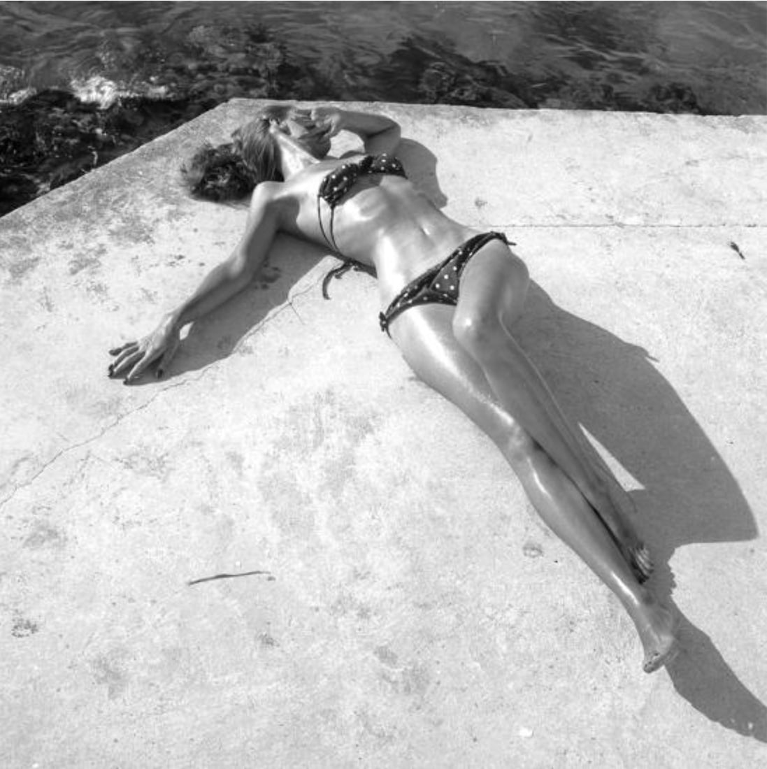 Tanning Print: Tanning Print. Female, Bikini. 23.00 x 22.75 inches. Please be aware that all lots in our auctions are sold "AS IS," in accordance with the Terms & Conditions of the Auction. All "dates" inside