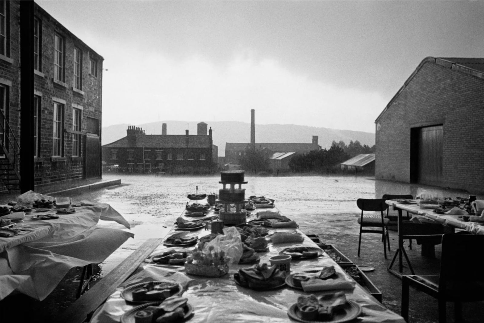 Martin Parr (British, 1952-2025) Print: Martin Parr (British, 1952-2025) Print. Jubilee street party, Elland, England, "1977". 22.00 x 14.00 inches. Please be aware that all lots in our auctions are sold "AS IS," in accordance with the Term