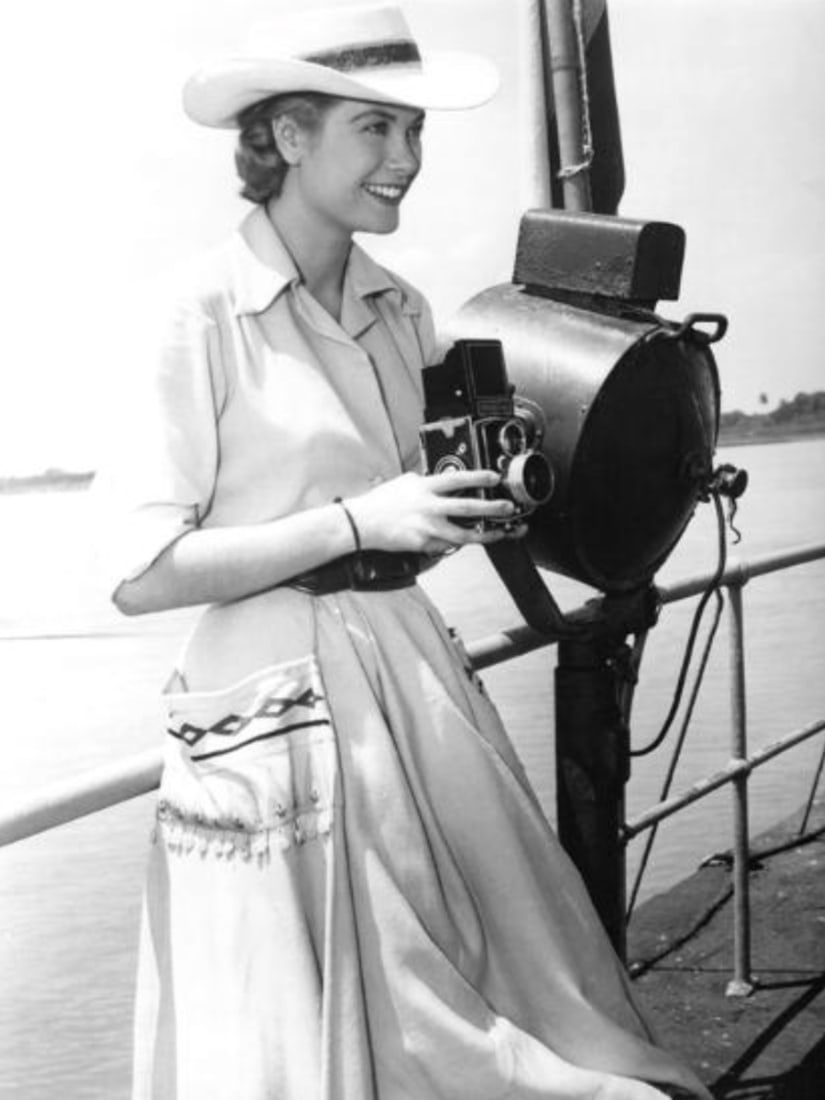 Grace Kelly (American, 1929-1982) Print: Grace Kelly (American, 1929-1982) Print. 35.00 x 46.00 inches. Please be aware that all lots in our auctions are sold "AS IS," in accordance with the Terms & Conditions of the Auction. All "dates"