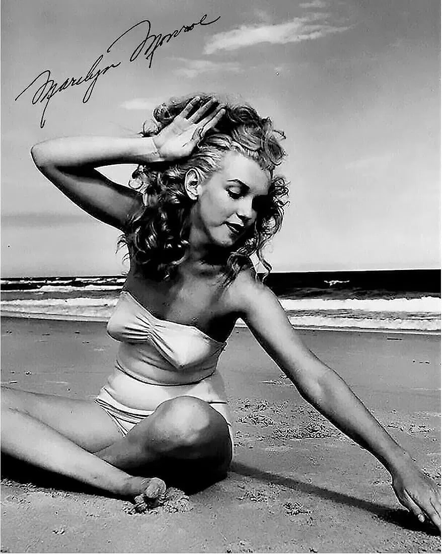 Marilyn Monroe Signed Facismile Photo Print: Marilyn Monroe Signed Facismile Photo. Signed in the print. Please be aware that all lots in our auctions are sold "AS IS," in accordance with the Terms & Conditions of the Auction. All "dates" inside