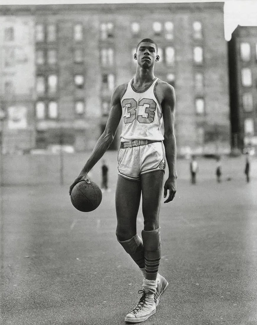 Richard Avedon (American, 1923-2004) Print: Richard Avedon (American, 1923-2004). Lew Alcindor, New York City, "1963" Print. Printed in 1999. 7.15 x 9.05 inches. Please be aware that all lots in our auctions are sold "AS IS," in accordance