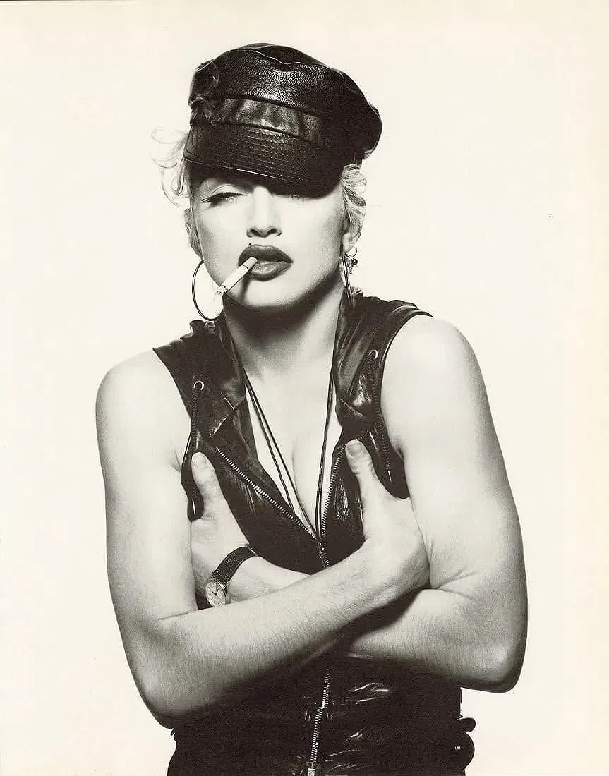 Patrick Demarchelier (French, 1943-2022) Print: Patrick Demarchelier (French, 1943-2022) Print. Madonna, New York, "1990". Printed in 1997, Italy. 9.25 x 11.75 inches. Please be aware that all lots in our auctions are sold "AS IS," in accordance wi