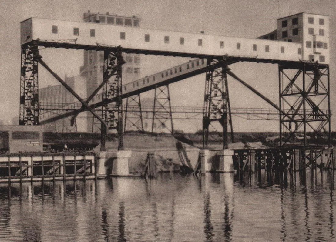 E.O. Hoppe (German, 1878-1972) Print: E. O. Hoppe (German, 1878-1972) Print. O. HOPPE (German, 1878-1972) Print. Elevators, Houston Texas. Printed in 1927. 8.50 x 6.00 inches. Please be aware that all lots in our auctions are sold "AS