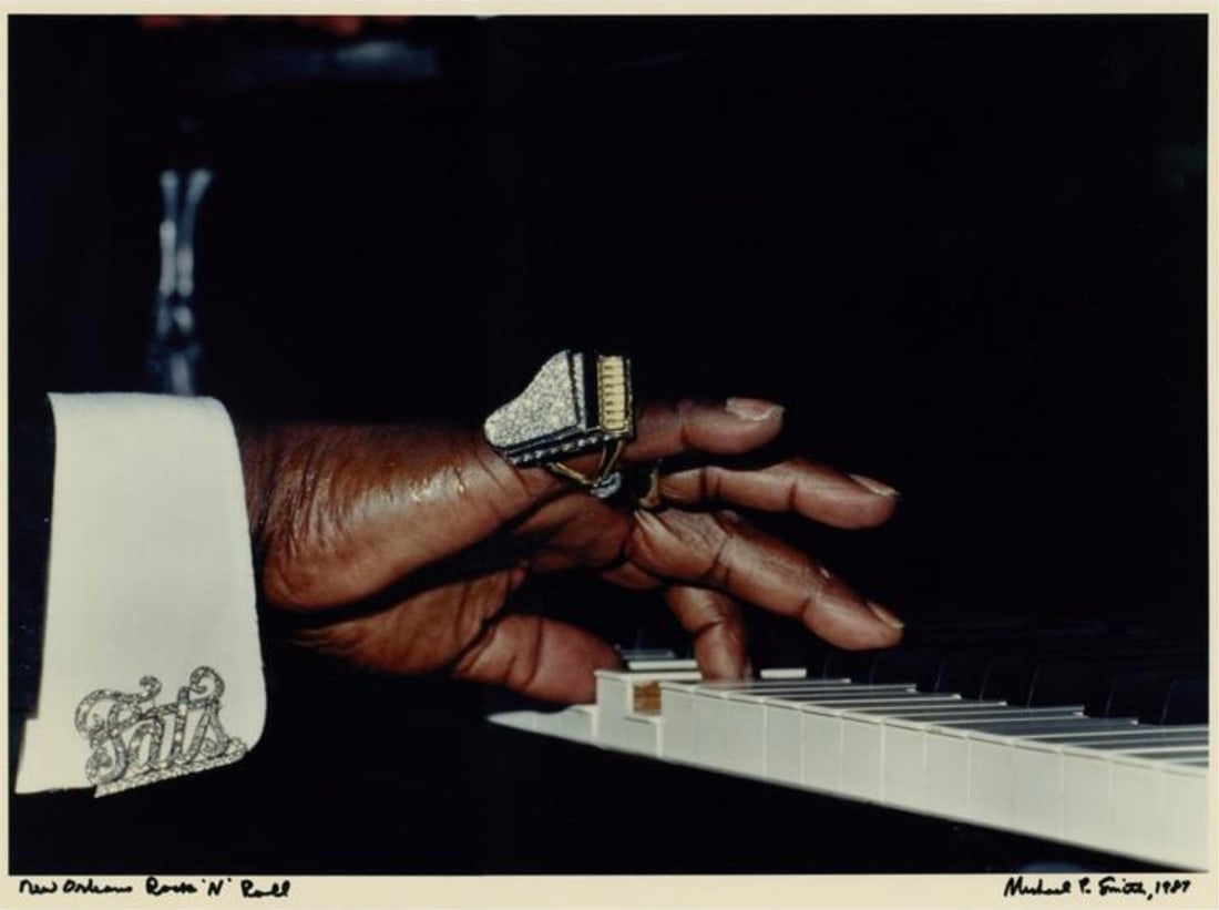 Michael P. Smith (American, 1937-2008) Print: Michael P. Smith (American, 1937-2008) Print. New Orleans Rock N Roll, Fats Domino, "1987". Plate marked. Bonded to fabric. 37.25 x 27.25 inches. Please be aware that all lots in our auctions are