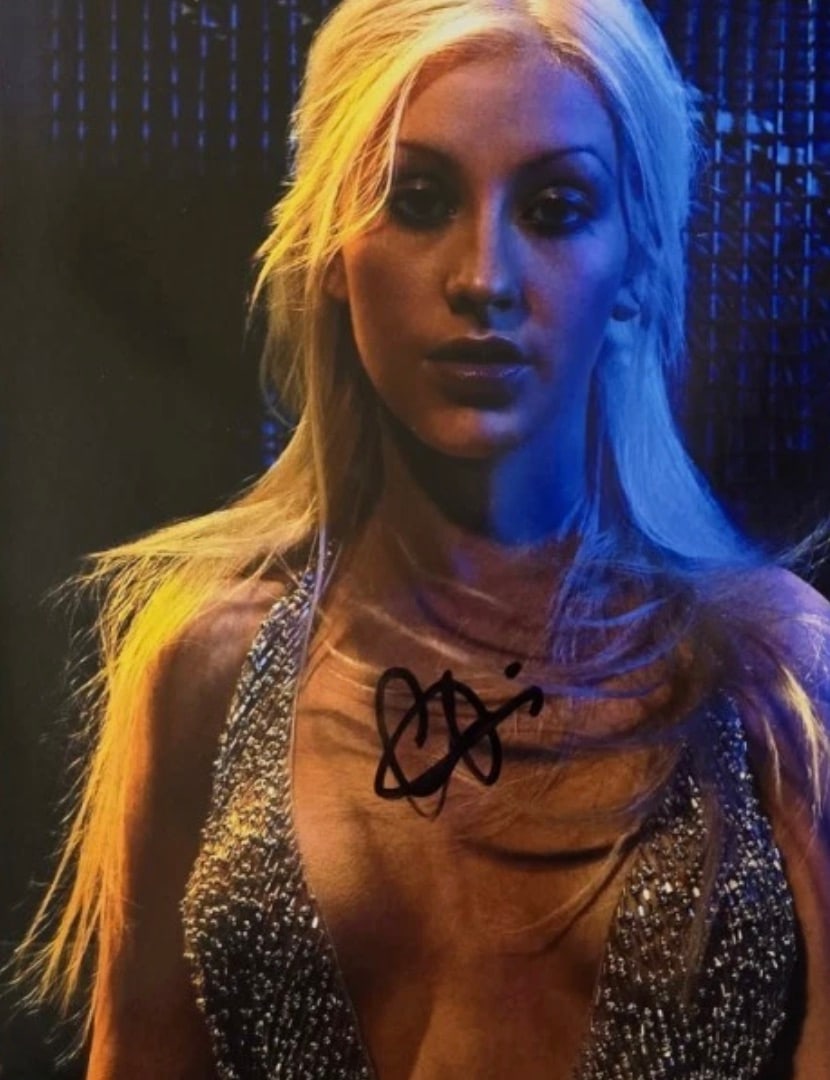Christina Aguilera (American, b. 1980) Photograph: Christina Aguilera (American, b. 1980) Photograph. Signed in marker. Please be aware that all lots in our auctions are sold "AS IS," in accordance with the Terms & Conditions of the Auction. All